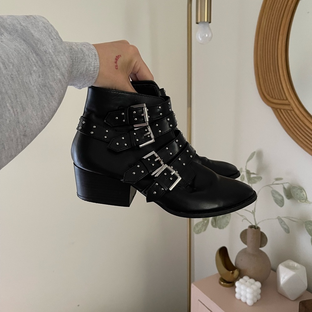black buckle heeled ankle boots